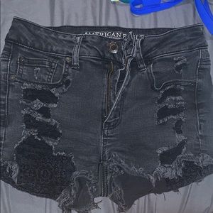 Black ripped shorts